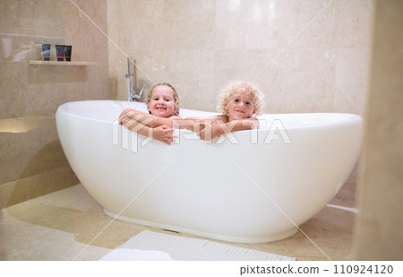 Kids in bath rub. Child bathing. Kids in bath rub. Child bathing. 110924120