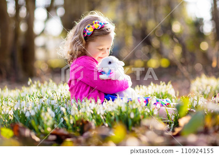 Child with rabbit. Easter bunny. Kids and pets. Child with rabbit. Easter bunny. Kids and pets. 110924155