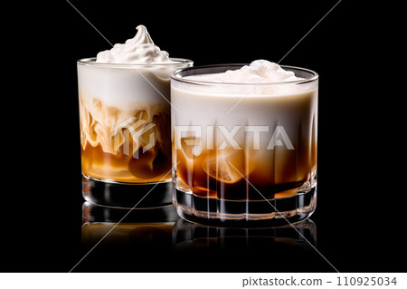 Set of White Russian cocktail featuring layers of cream, coffee liqueur and vodka 110925034