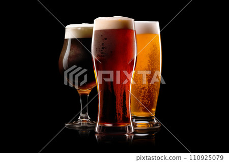 Set of Beer glasses on a black background. Mugs with drink like Ipa, Pale Ale, Pilsner, Porter or Stout Set of Beer glasses on a black background. Mugs with drink like Ipa, Pale Ale, Pilsner, Porter or Stout 110925079