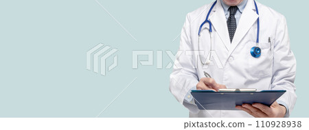 A doctor who is writing a medical record or taking an interview 110928938
