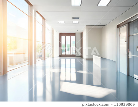 Light blurred background. The hall of an office or medical institution with panoramic windows and a perspective. Light blurred background. The hall of an office or medical institution with panoramic windows and a perspective. 110929809