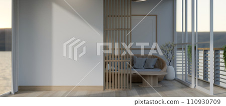 Interior design of a modern, minimalist living room with a white mockup wall and a balcony. Interior design of a modern, minimalist living room with a white mockup wall and a balcony. 110930709