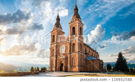 church bathed in the setting sun 110932580