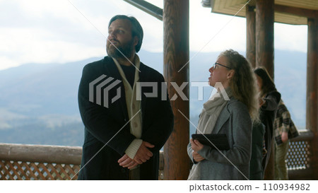 Female real estate agent talks to man about renting or buying new house Female real estate agent talks to man about renting or buying new house 110934982