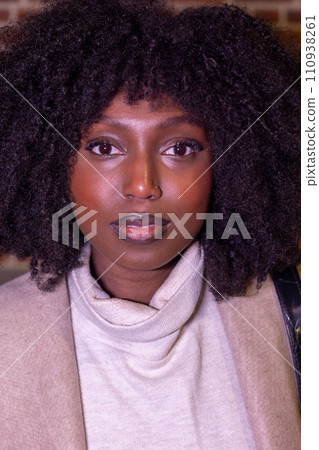 Soulful Elegance: Close-Up of a Confident Woman Soulful Elegance: Close-Up of a Confident Woman 110938261