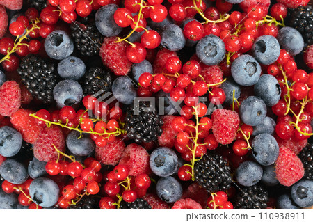 Fresh raspberries, blackberries, redcurrant and blueberries in a wooden bowl Fresh raspberries, blackberries, redcurrant and blueberries in a wooden bowl 110938911