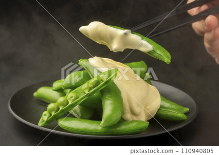 Freshly boiled snap peas with chopsticks Freshly boiled snap peas with chopsticks 110940805