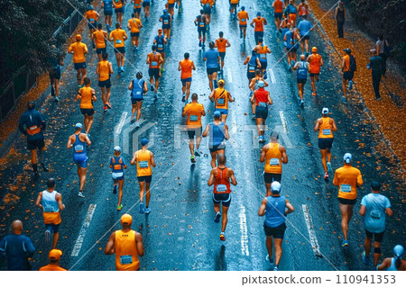 People running marathons as a sport in the city 110941353
