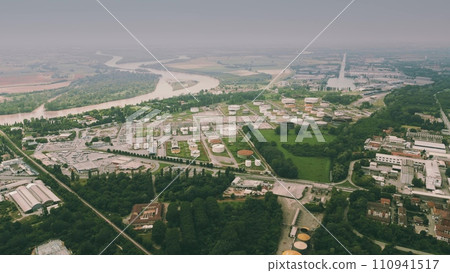 Aerial view of an oil refinery in Cremona close to the Po River. Lombardia, Italy Aerial view of an oil refinery in Cremona close to the Po River. Lombardia, Italy 110941517