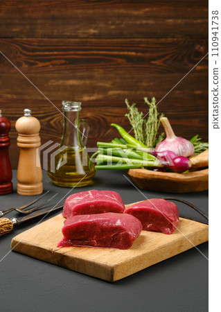 Raw beef fillet cut on portions Raw beef fillet cut on portions 110941738