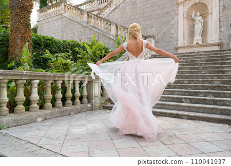 bride in a dress is spinning in a dance bride in a dress is spinning in a dance 110941937