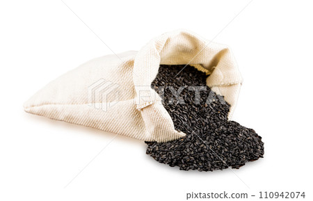 Back sesame in burlap isolated on white background Back sesame in burlap isolated on white background 110942074
