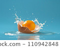 fresh orange with water splash on blue background 110942848
