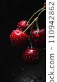 ripe red ripe sweet cherry on black background 110942862