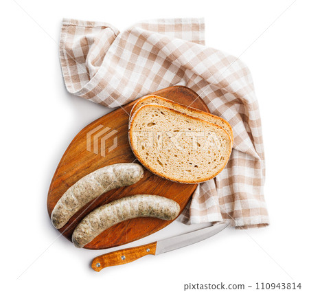 White pudding sausage. Pork product and bread on cutting board isolated on white background. 110943814
