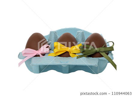 PNG,Chocolate eggs in a tray, isolated on white background 110944063