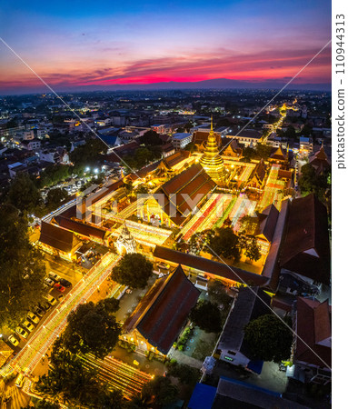 Aerial view of Wat Phra That Haripunchai Woramahawihan during Loy Krathong festival, in Lapmhun 110944313