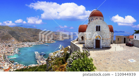 Scenic traditional greek isalnds. Kalymnos island in Dodecanese. Pothia town and harbor with fishing boats. Greece travel Scenic traditional greek isalnds. Kalymnos island in Dodecanese. Pothia town and harbor with fishing boats. Greece travel 110944939