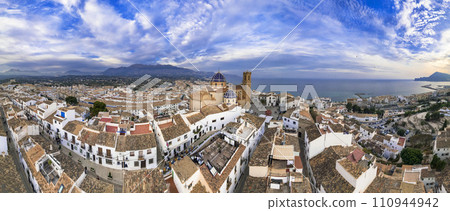Charmig coastal town Altea in popular coast of Spain Costa Blanca. aerial drone high angle  panoramic view with scenic cathedral, Valencia province 110944942