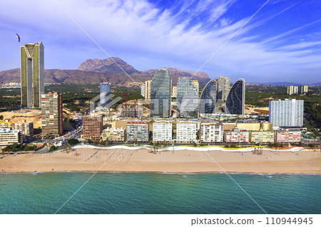 Benidorm city of Costa Blanca, Spain. Aerial drone panoramic high angle view, coastal cityscape panorama 110944945