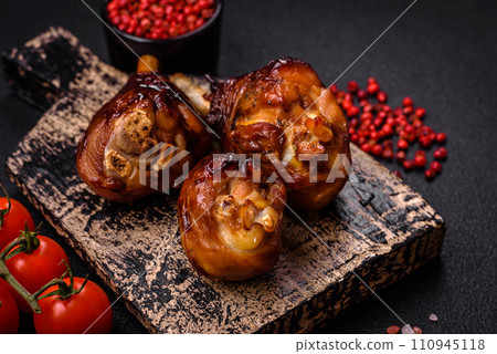 Delicious grilled chicken legs with spices and herbs in teriyaki sauce 110945118