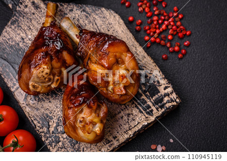 Delicious grilled chicken legs with spices and herbs in teriyaki sauce 110945119