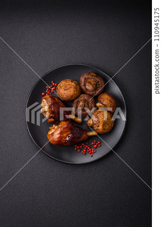 Delicious grilled chicken legs with spices and herbs in teriyaki sauce 110945175
