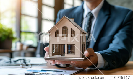 AI-generated content. Man Holding a Small Model of a House AI-generated content. Man Holding a Small Model of a House 110946147