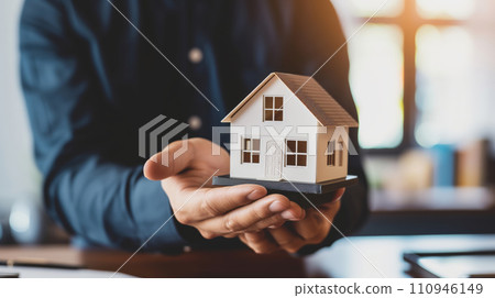 AI-generated content. Man Holding a Small Model of a House AI-generated content. Man Holding a Small Model of a House 110946149