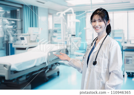 A female doctor working in a hospital 110946365