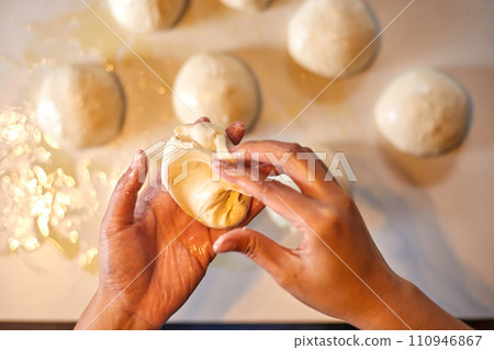 Close up hands preparing dough 110946867