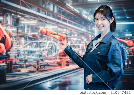 Young woman working at a car factory Young woman working at a car factory 110947421