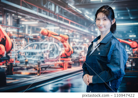 Young woman working at a car factory Young woman working at a car factory 110947422