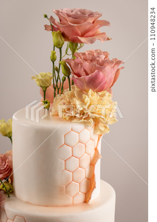 Wedding cake with flowers 110948234