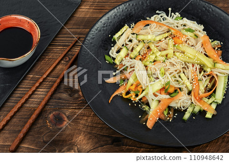 Chinese salad with enoki mushrooms. Chinese salad with enoki mushrooms. 110948642