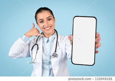 Happy woman doctor with phone making call me gesture 110949288