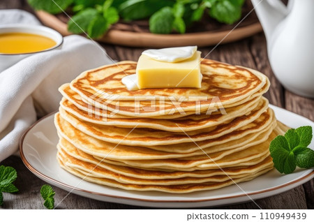 stack of very thin pancakes. traditional for Russian pancake week. Shrove tide 110949439