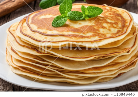 stack of very thin pancakes. traditional for Russian pancake week. Shrove tide 110949440