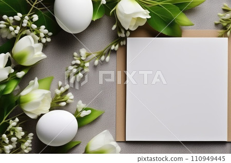 Fresh Spring flowers with Easter Eggs on Wood 110949445