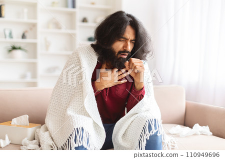 Ill Millennial Guy Covered With Warm Blanket Suffering 110949696
