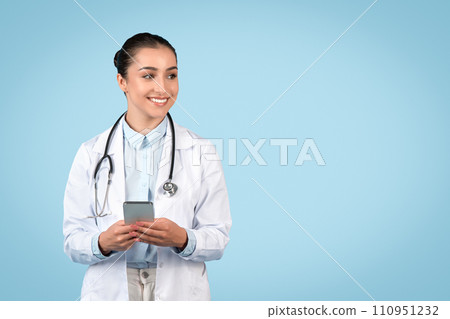 Woman medic using mobile technology for healthcare Woman medic using mobile technology for healthcare 110951232