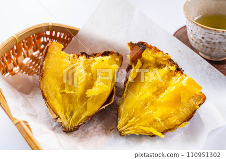 Grilled sweet potato cut in half Kuri Kaguya Grilled sweet potato cut in half Kuri Kaguya 110951302