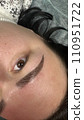 Close up view of beautiful brown female eye. Perfect trendy eyebrow. Good vision, contact lenses, brow bar or fashion eyebrow makeup concept 110951722