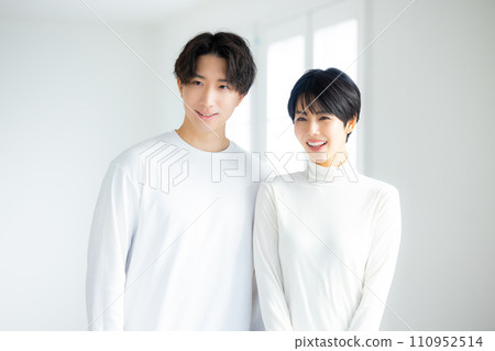 A couple in the living room A couple in the living room 110952514