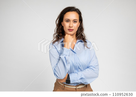 Pensive serious young european businesswoman, teacher in formal wear think Pensive serious young european businesswoman, teacher in formal wear think 110952630