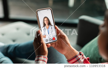 Telemedicine. Unrecognizable Woman Using Smartphone, Making Video Conference With Her Therapist Doctor 110953316