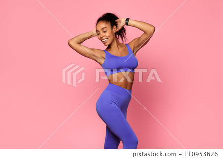Fit Black Woman Wearing Sportswear Standing Over Pink Studio Backdrop 110953626
