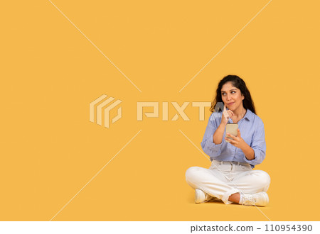 Pensive happy latin millennial brunette woman think, look at copy space, create idea Pensive happy latin millennial brunette woman think, look at copy space, create idea 110954390