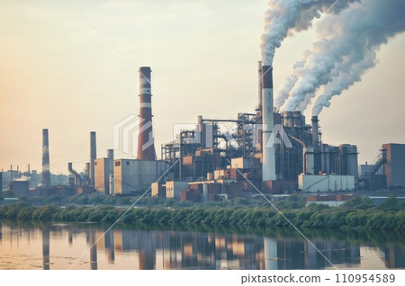 A factory with multiple smokestacks emitting pollution into the air. 110954589